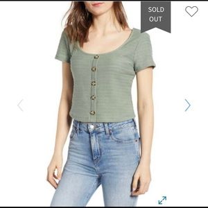 Green colored crop top.